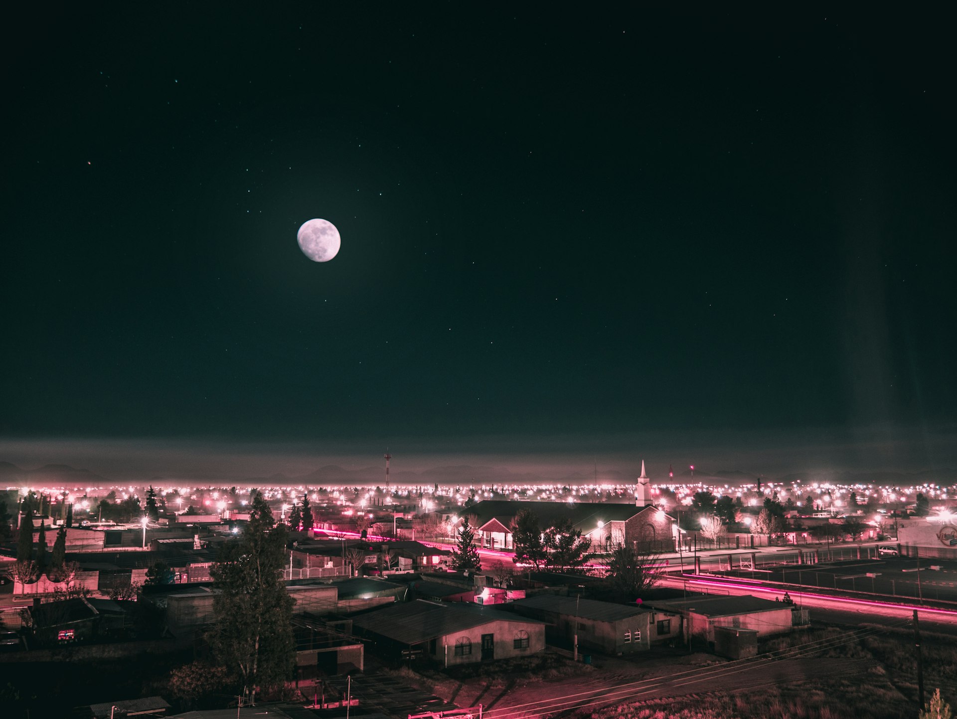 photo of high-rise building during nighttime